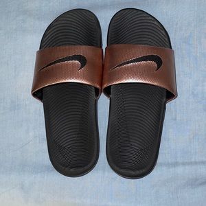 Nike gold slides Womens Size 6.